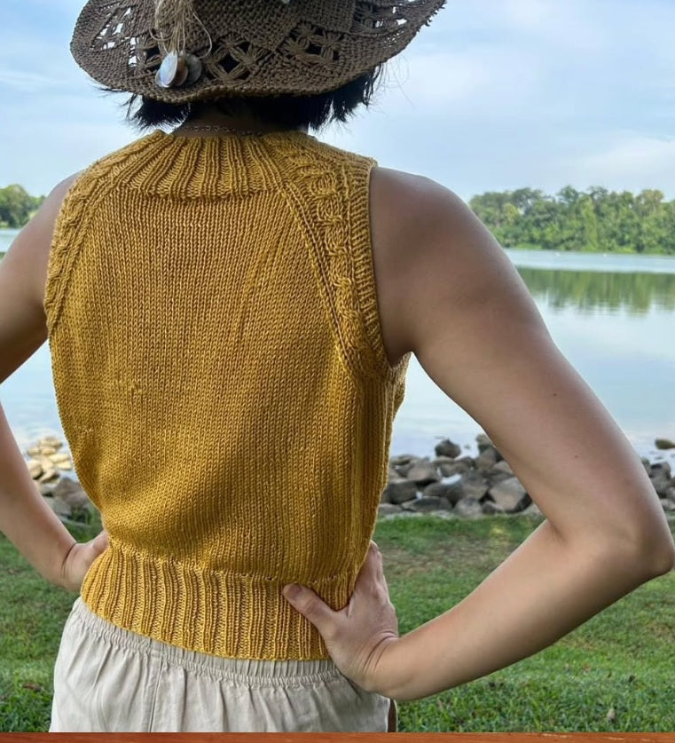 Free Knitting Pattern: Cable Detail Cutaway Top by Debbie Bliss