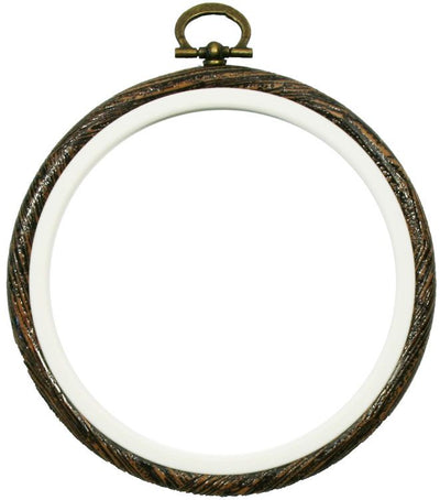 A close-up of the textured wood-grain plastic hoop, highlighting the flexible, non-slip design