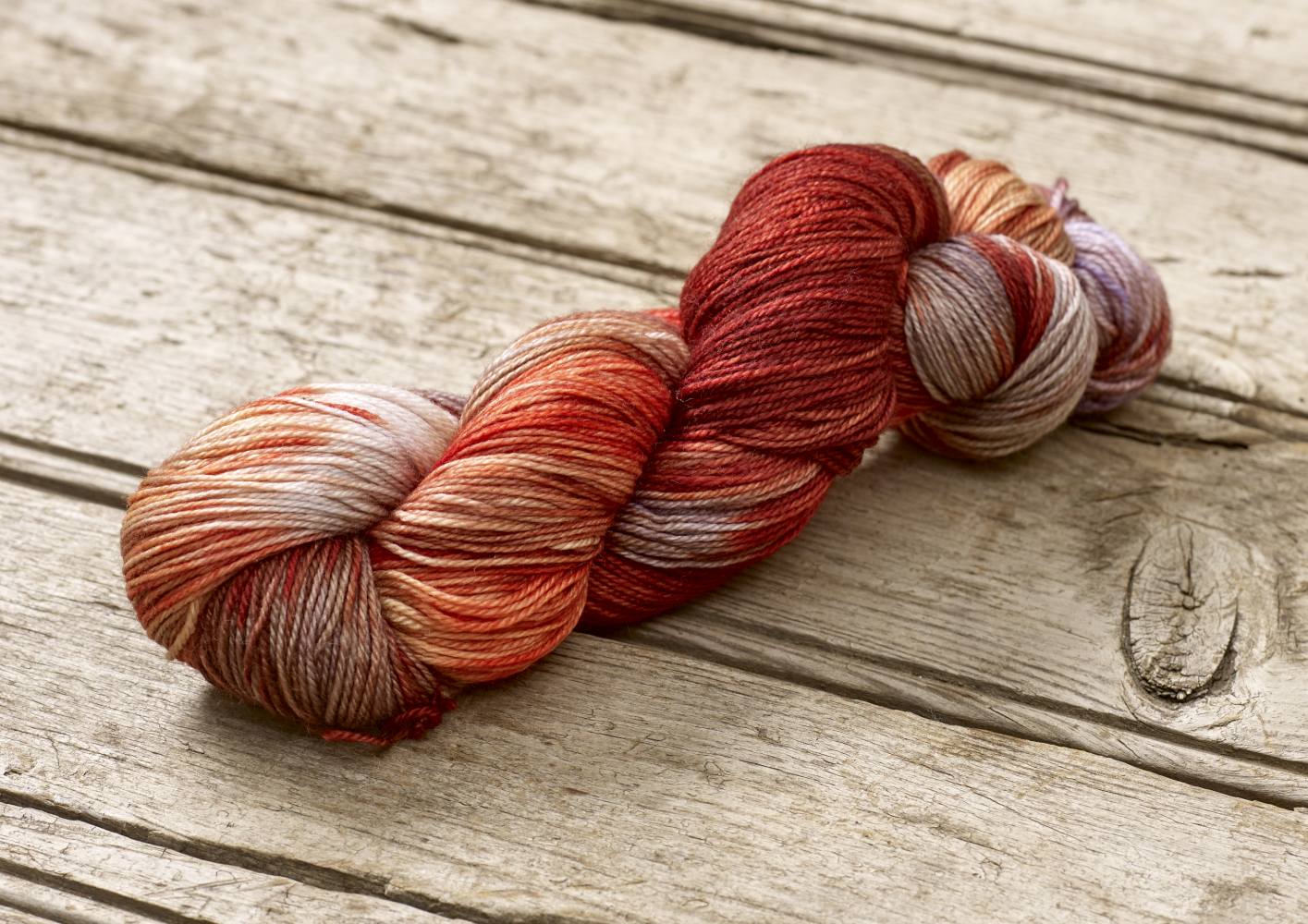 Hand dyed Multicolored skein of yarn by Alegria Yarn by Manos del Uruguay. 75% Superwash Merino Wool, 25% Polyamide (Nylon) for durability.