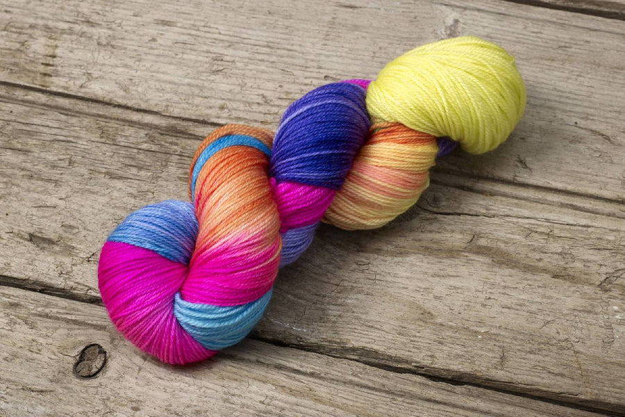 Hand dyed Multicolored skein of yarn by Alegria Yarn by Manos del Uruguay. 75% Superwash Merino Wool, 25% Polyamide (Nylon) for durability.
