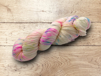 Hand dyed Multicolored skein of yarn by Alegria Yarn by Manos del Uruguay. 75% Superwash Merino Wool, 25% Polyamide (Nylon) for durability.