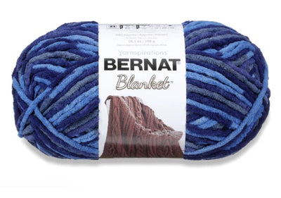 Bernat Blanket Yarn 300g 'Big Ball' in a variegated shade of blue hue; a high-yardage chunky yarn for fast-growing DIY home projects and cozy throws.