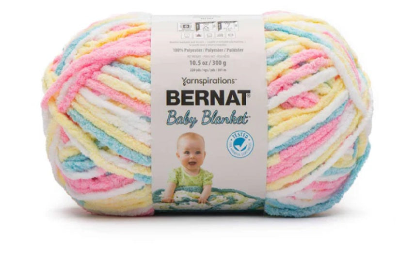 Bernat Blanket 300g super bulky chenille yarn in variegated  pastel colours of pink, blur and white; a 100% polyester soft-touch yarn for quick-knit afghans and crochet blankets