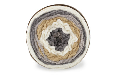 A skein of Bernat Blanket Stripes yarn in brown, gray and white colors.
