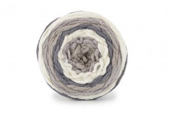 A skein of Bernat Blanket Stripes yarn in gray and white colors.