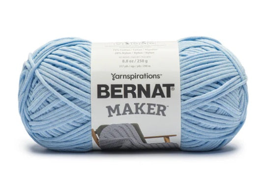 Close-up of Bernat Maker Home Dec showing the smooth jersey-tube construction and high-definition stitch work; ideal for machine-washable home decor. In sky blue colour
