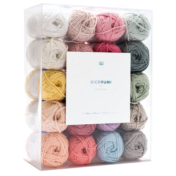 A professional-grade set of 20 miniature balls of Creative Ricorumi DK yarn in a curated pastel color palette. The high-definition 100% cotton balls are neatly arranged to display a soft, harmonious range of hues engineered for crocheting cute amigurumi dolls, animals, and decorative miniature figures. Each 25g ball features a smooth, matte finish and a tight multi-ply twist for superior stitch clarity