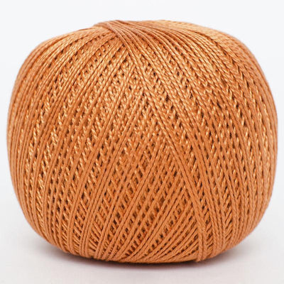 A ball of warm orange-brown thread or yarn, photographed on a clean white background.