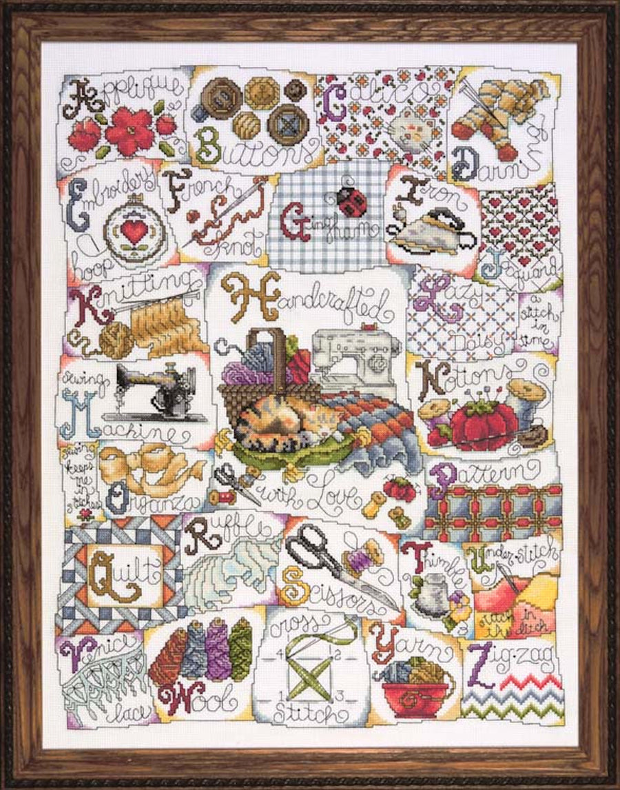Contents of Design Works Stitching ABC kit: includes 100% cotton embroidery floss, 14-count white Aida cloth, a needle, and a large, easy-to-read color chart