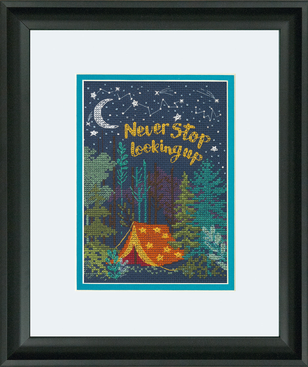 A cross-stitch kit depiction of a night campsite with a clear night sky filled with stars and a crescent moon, surrounded by greenery. The text 'NEVER STOP LOOKING UP' is visible at the top.