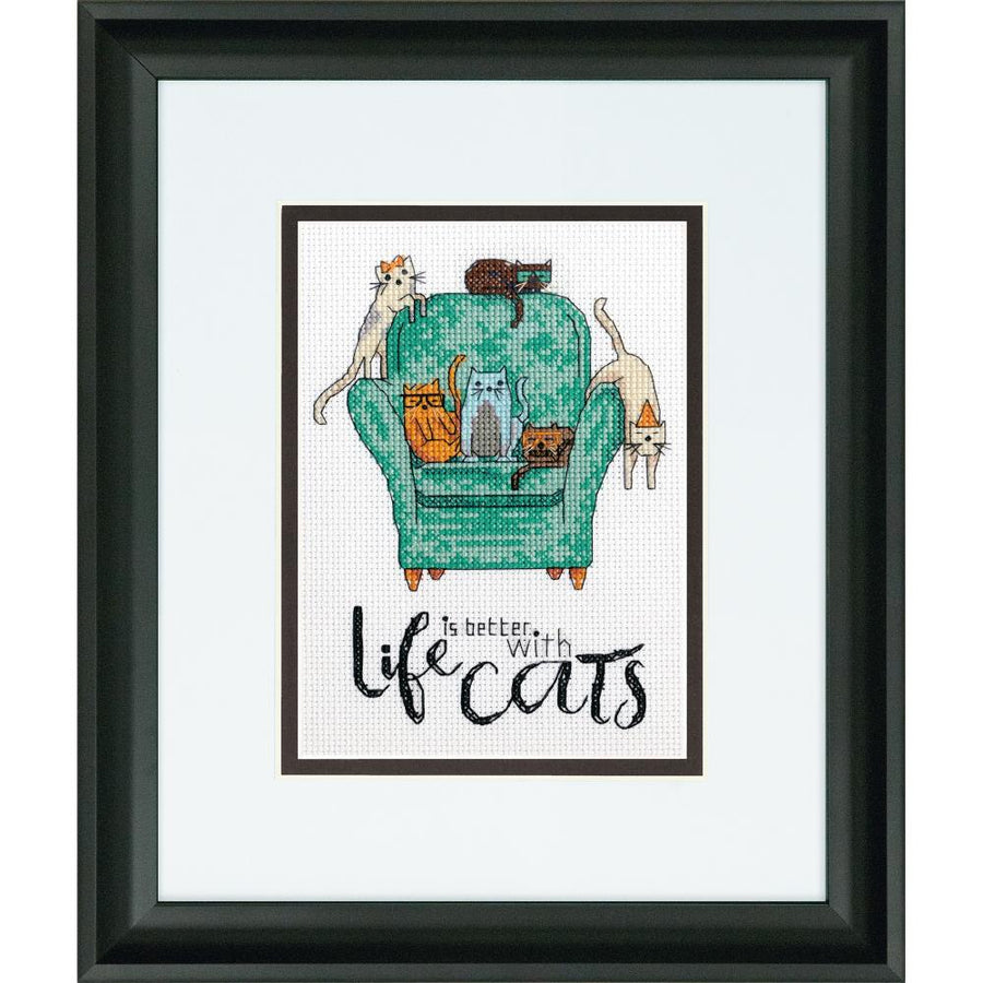 A charming Dimensions counted cross-stitch kit titled 'Playful Cats.' The design features a whimsical illustration of several cats lounging together with the quote 'Life is better with cats' in a friendly font. The kit includes 14-count white Aida fabric, all necessary embroidery threads, a needle, and a clear pattern sheet for a 5x7 inch finished piece