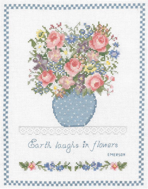 A complete "Earth Laughs in Flowers" cross stitch kit, featuring a vibrant floral design and inspirational quote, with premium embroidery floss, fabric, and a needle.
