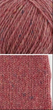 A 50g ball of Etrofil Rainbow Organic Merino yarn, showcasing its plush, rounded twist. The image highlights the rich texture of the 75% organic merino wool and 25% polyamide blend, ideal for creating cozy, high-quality winter accessories like beanies, scarves, and cardigans in red