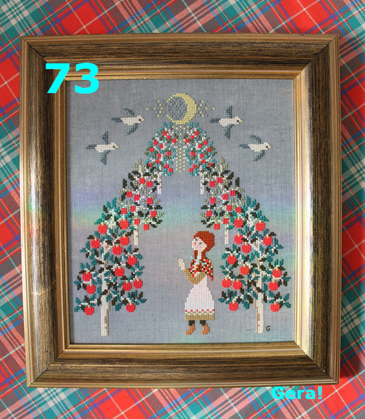 A professional-grade counted cross-stitch chart by GERA! designed by Kyoko Maruoka, titled 'Ann.' The high-definition cover reveals a whimsical, storybook-style portrait character design rendered in a sophisticated, nostalgic pixel art aesthetic.