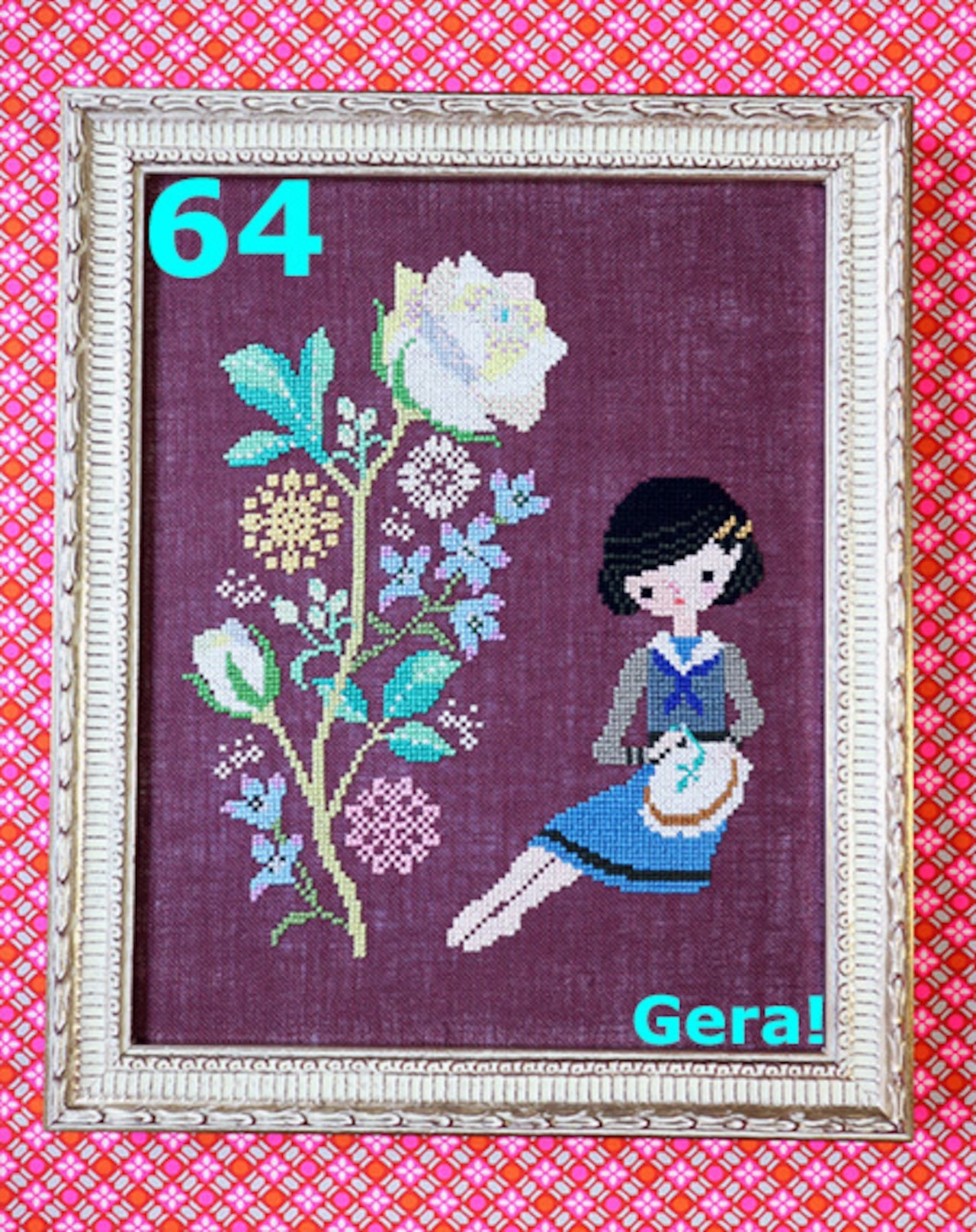 A professional-grade counted cross-stitch chart pack by GERA! designed by Kyoko Maruoka, titled 'Roses.' Inspired by Osamu Dazai's literary work 'The Schoolgirl,' the design features an intricate arrangement of stylized roses rendered in a sophisticated, vintage pixel art aesthetic. The product layout is a pristine, high-definition A4-size booklet containing a highly legible black-and-white symbol graph and explicit DMC embroidery floss color number mappings. Fabric, threads, and needles are excluded.