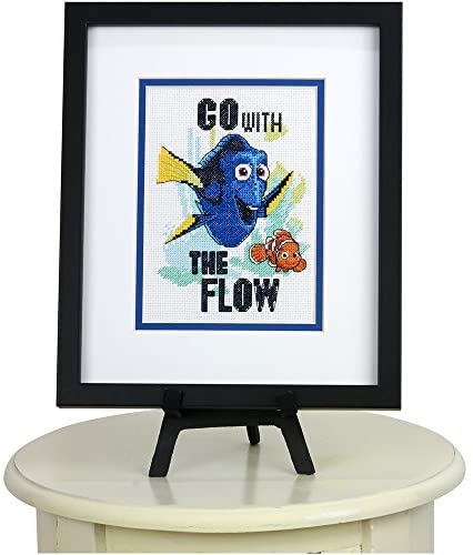 Framed cross-stitch art of Dory and Nemo with 'Go with the Flow' text on a white background. 
Finding Nemo Cross Stitch Kit, Dimensions Disney Cross Stitch