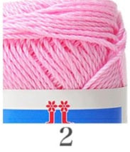 A skein of Hamanaka Cotton Nottoc yarn from Japan, showing its unique knotted texture and natural matte finish in a baby pink colour