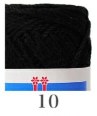 A variety of colorful Hamanaka Cotton Nottoc yarn skeins, with a focus on a green skein in the foreground. The yarn is made in Japan and is advertised for crafting and crochet.