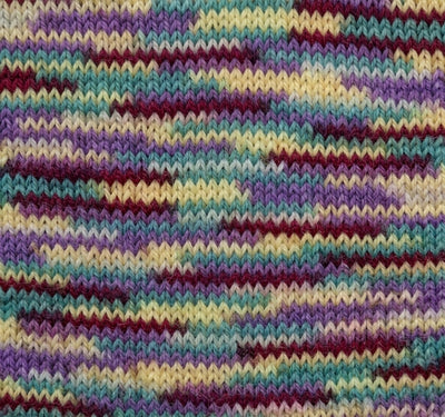Multicolored knitted fabric with a wavy pattern with Hamanaka KORPOKKUR Multi-Colour Yarn | Made in Japan