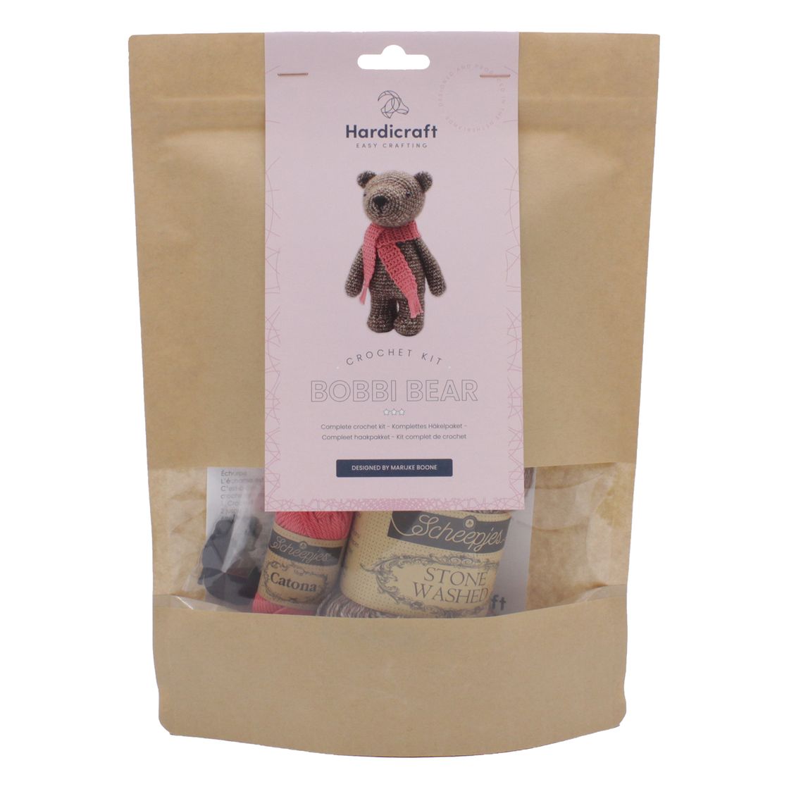 Crocheted bear kit with packaging featuring a bear illustration and Hardicraft branding.