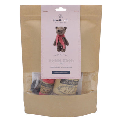 Crocheted bear kit with packaging featuring a bear illustration and Hardicraft branding.