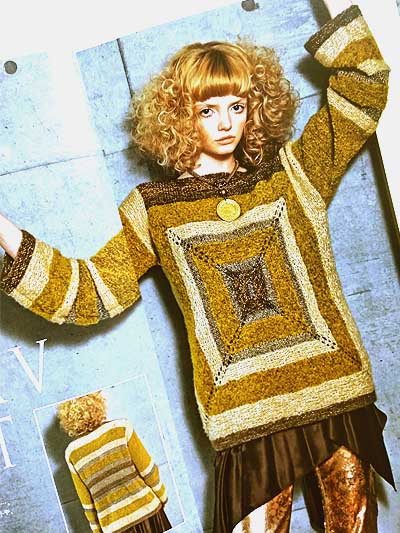 An interior page showing a full-length designer cardigan with intricate cable work and avant-garde styling