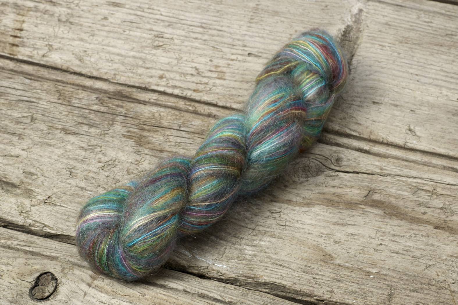 Hand-dyed Cabrito lace yarn by Manos del Uruguay, 80% kid mohair and 20% polyamide blend for luxury knitting.