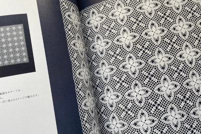 High-resolution crochet chart and close-up photograph of a delicate floral lace pattern from Nihon Vogue