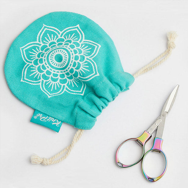 The signature mint green protective pouch with the KnitPro logo, holding the colorful folding scissors