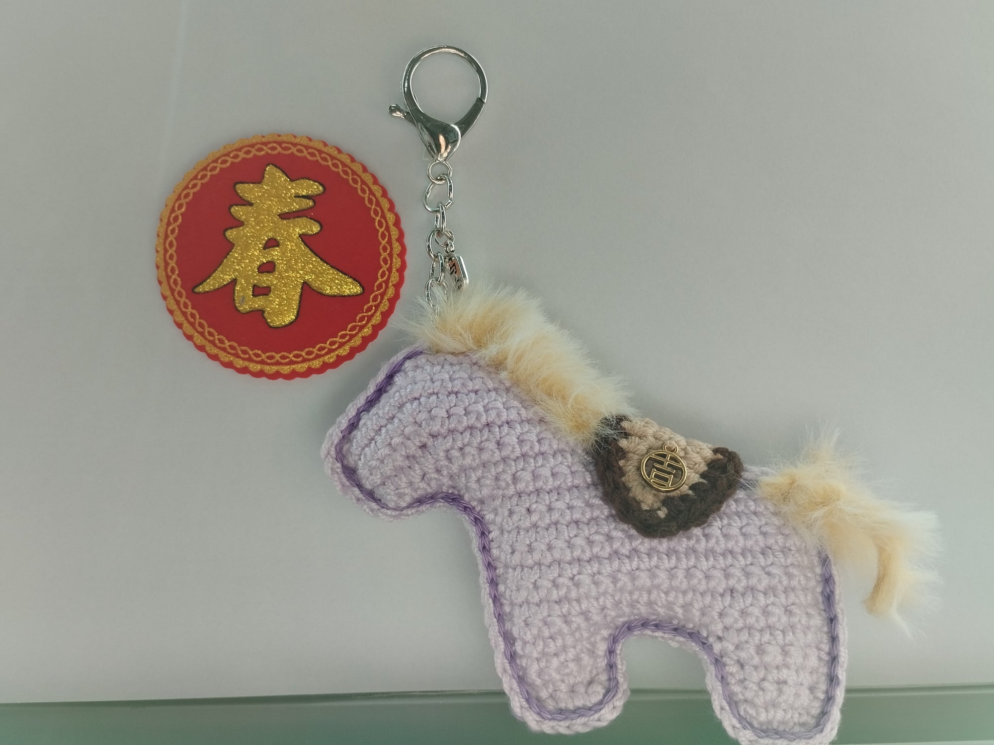 Crocheted horse keychain crocheted in Singapore artisan made