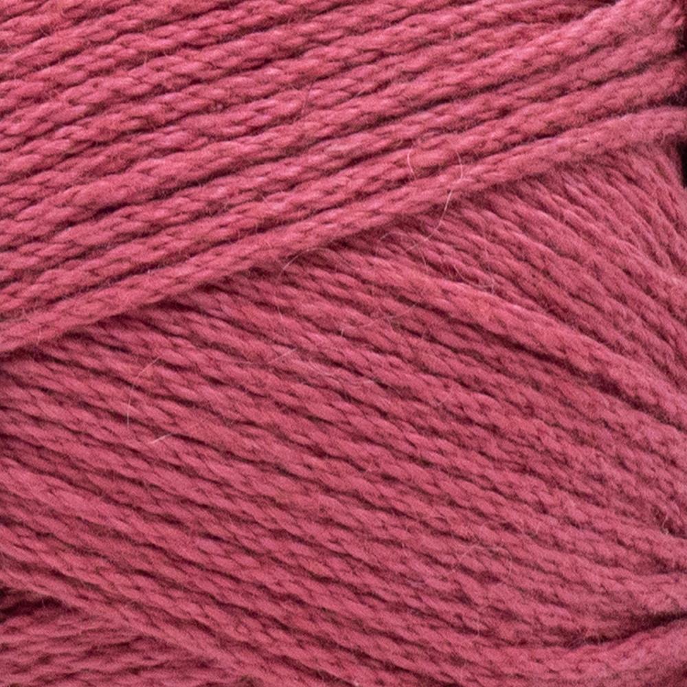 A skein of Lion Brand 24/7 Cotton yarn, highlighting the shiny mercerized finish and tightly plied 100% cotton texture in tetra pink colour