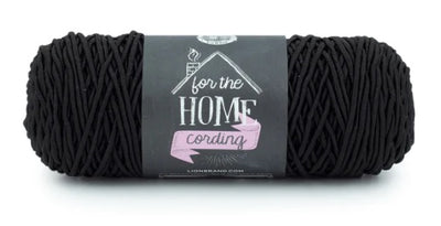 A versatile skein of Lion Brand Cording Yarn, ideal for crocheting and knitting sturdy home items like storage baskets, floor poufs, plant hangers, and decorative placemats.