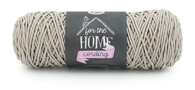 A versatile skein of Lion Brand Cording Yarn, ideal for crocheting and knitting sturdy home items like storage baskets, floor poufs, plant hangers, and decorative placemats.