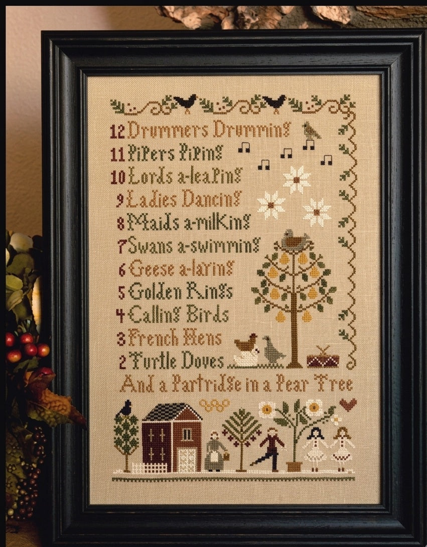 A professional-grade cross-stitch chart by Little House Needleworks titled '12 Days of Christmas.' The high-definition design features twelve individual 'bitesize' vignettes, each representing a day from the famous holiday carol, from the partridge in a pear tree to the twelve drummers drumming. The sampler is arranged in a soulful, vertical layout with a boutique primitive border. The artwork is characterized by a sophisticated, muted color palette and artisanal motifs, designed to be finished on high-qual