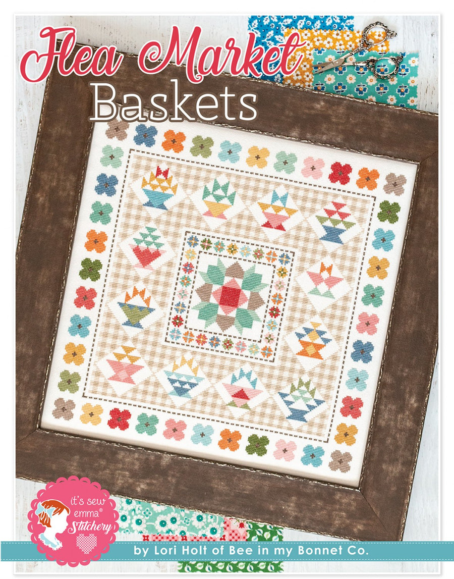 A professional-grade cross-stitch kit by Lori Holt titled 'Flea Market Baskets.' The high-definition design features an array of stylized baskets in various artisanal shapes and colors, each filled with whimsical flowers or craft-related items. The aesthetic is cheerful and vintage-inspired, capturing a high-quality, country-cottage feel."