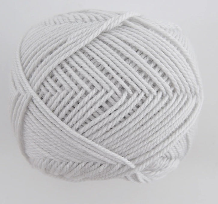 Close-up of premium Japanese Pierrot Fine Merino wool, showcasing the smooth, anti-pilling texture and fine weight suitable for intricate knitting in mist grey colour