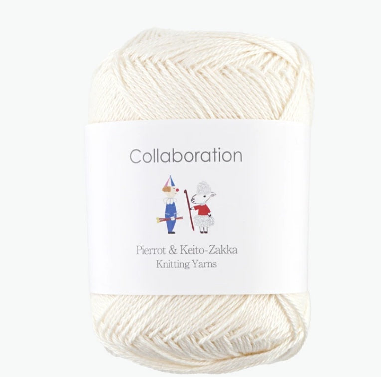 Off white ivory yarn 50% Cotton, 50% Rayon, Made in Japan
Close-up of the Pierrot Caro yarn strands, highlighting the high-quality Japanese spinning and the crisp yet soft fiber profile.