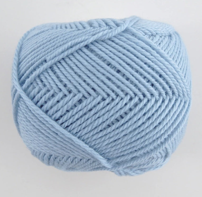 Close-up of premium Japanese Pierrot Fine Merino wool, showcasing the smooth, anti-pilling texture and fine weight suitable for intricate knitting in sky blue