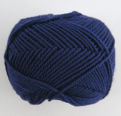 Close-up of premium Japanese Pierrot Fine Merino wool, showcasing the smooth, anti-pilling texture and fine weight suitable for intricate knitting in navy blue