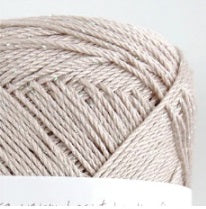 Pure silk fingering yarn, high-drape silk yarn, breathable summer yarn, silk for lace shawls, premium Japanese needlecraft supplies. 
A luxurious 40g ball of Pierrot Julien 100% Silk yarn in a soft champagne pink beige, showcasing its brilliant natural luster in powder pink beige