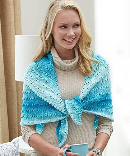 The yarn has a classic 4-ply twist and a soft matte finish, perfect for creating shawls, blankets, and garments with a natural ombré effect