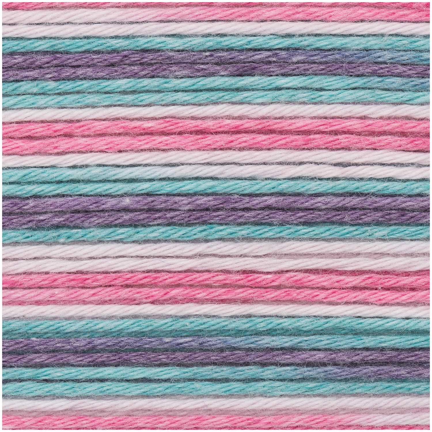 Close-up of the smooth, matte finish of the Baby Cotton Soft Print yarn, showing the clean ply and vibrant 'print' color transitions from pink to turquoise