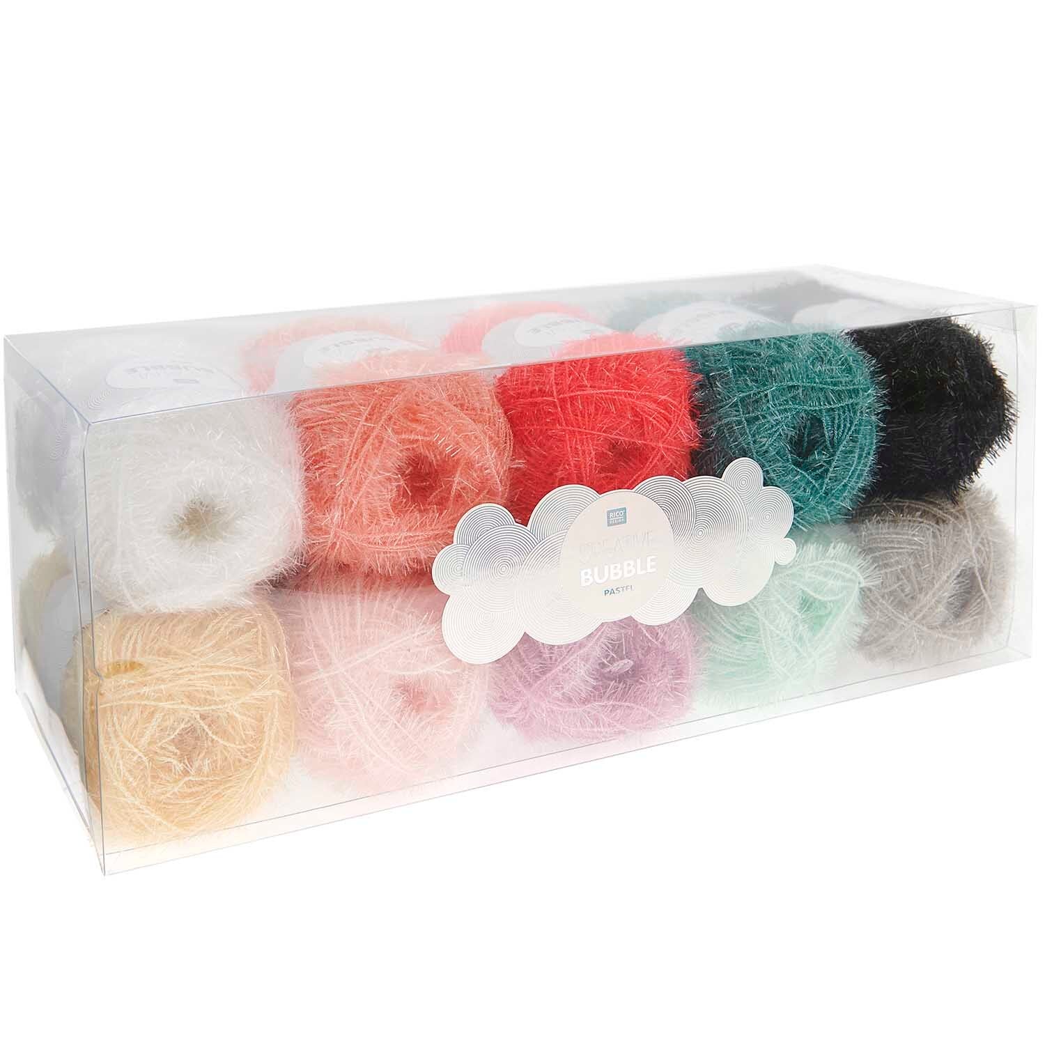 Sparkling rainbow pastel-colored Rico Bubble yarn with a unique abrasive texture, perfect for DIY eco-friendly dish scrubbies and bath accessories