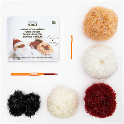 Rico Design Christmas crochet kit for making a Santa Claus amigurumi, including yarn, crochet tool, and an easy-to-follow pattern for beginners