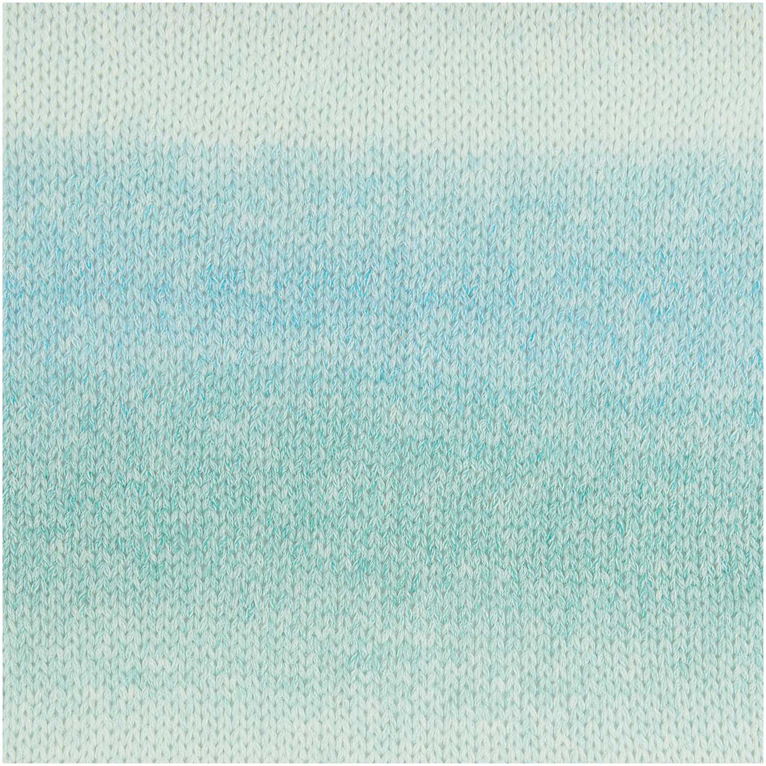 Close-up of the airy, chainette-style construction of the Light & Long yarn, highlighting its voluminous yet lightweight feel showing hues of mint green colours