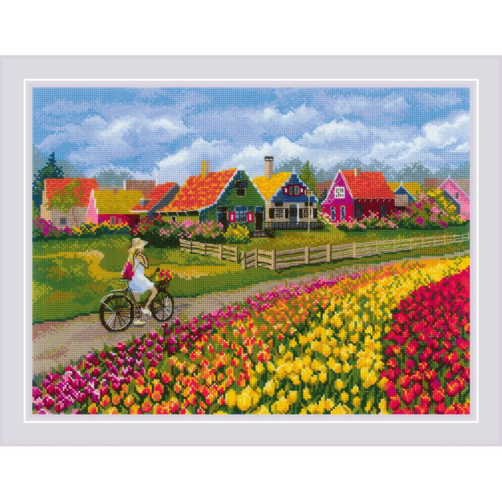 Using Riolis’ signature wool-acrylic threads adds a soft, "velvety" dimension to the tulip petals. It gives the field a tactile quality that standard cotton cannot achieve, making the flowers look lush and full.
