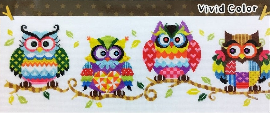 A professional-grade cross-stitch kit by SODA Stitch titled 'The Owl Family.' The high-definition design features a charming collection of owls with unique boutique personalities, organized in a playful family arrangement in Vivid Color'