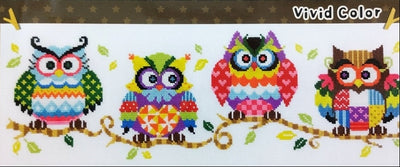 A professional-grade cross-stitch kit by SODA Stitch titled 'The Owl Family.' The high-definition design features a charming collection of owls with unique boutique personalities, organized in a playful family arrangement in Vivid Color'