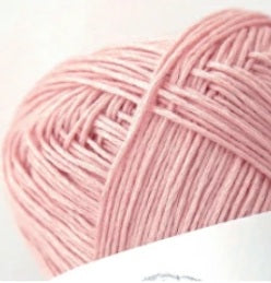 Light sakura pink yarn Silk Cashmere Made in Japan 
A luxurious ball of Kushel Silk Cashmere yarn, showcasing its soft halo and subtle, elegant sheen."