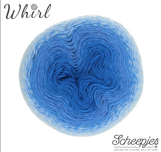 A versatile cake of Scheepjes Whirl gradient yarn, ideal for creating large, lightweight shawls, "one-cake" crochet projects, and garments with a beautiful, fluid drape and ombre finish. in hues of blue